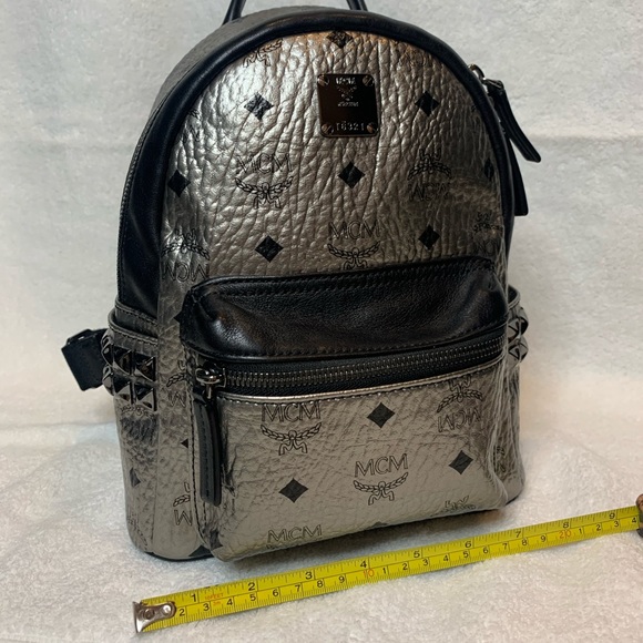 MCM Handbags - Like New! MCM Backpack, silver w/ pyramid studs